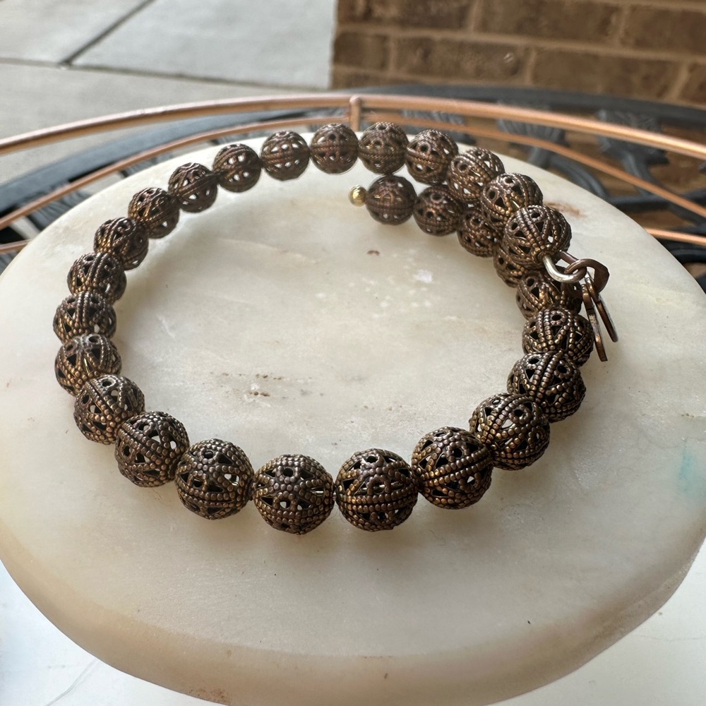 Gold filagree Alex and Ani beaded bracelet
